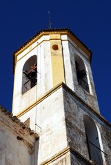Fototapeta premium View of the bell tower to the Incarnation Church, Yunquera, Spain.