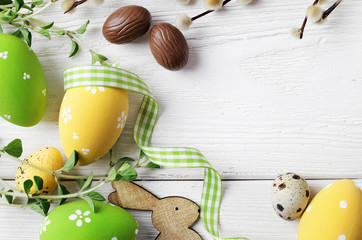 easter eggs on wooden background, copy space for text