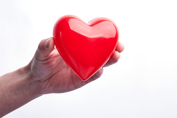 With a red loving hand