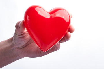 With a red loving hand