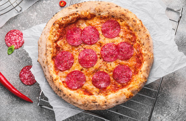 Tasty pizza on grey background