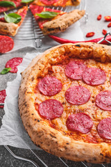 Tasty pizza on grey table