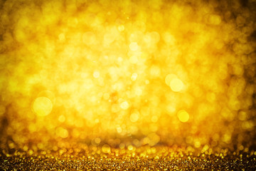 Abstract golden background with magic bokeh effect