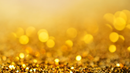 Abstract golden background with bokeh effect