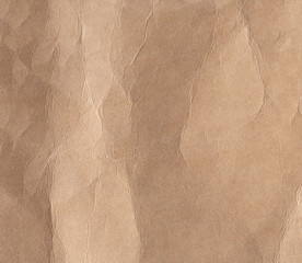 Brown crumpled paper texture background.