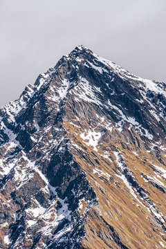 The snowy mountains of Valsesia seen from the val d'otro, during a sunny day near the town of Alagna, Italy - February 2020.