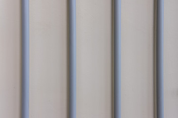 Lines of electric wires laid in a plastic casing on the wall