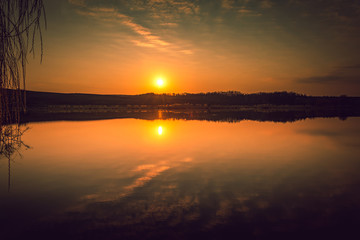 Obraz na płótnie Canvas Sunrise on river
