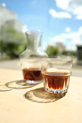 Stylish served specialty alternative black coffee. Filter pour-over coffee served in crystal glass and decanter. Aesthetics coffee