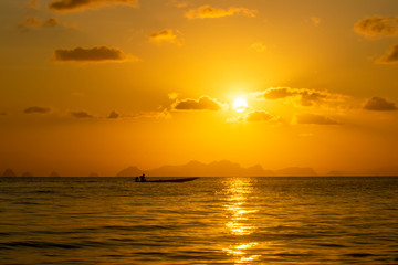 Sunset sky at the lake with dark clouds
