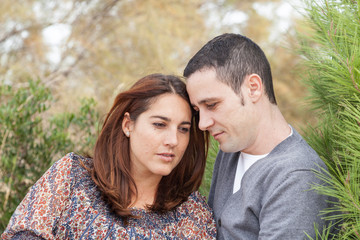 portraits of happy couples outside