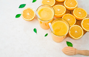 Healthy food, background, halves of oranges sliced for making orange juice