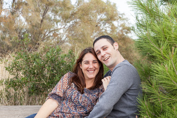 portraits of happy couples outside