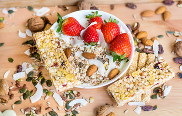 Healthy Breakfast with Muesli with Strawberries and Granola Bars
