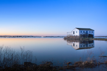 house in the middle of the rice fields of the albufera of valencia