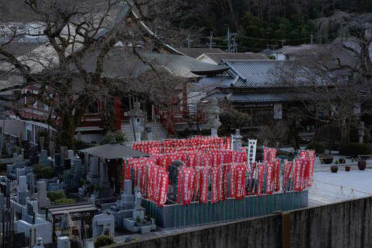 Japanese cemetery with red flgs