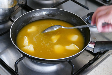 vegetable oil that melts in the pan on the hob,
