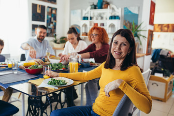 family gathering at home. vegan dinner party