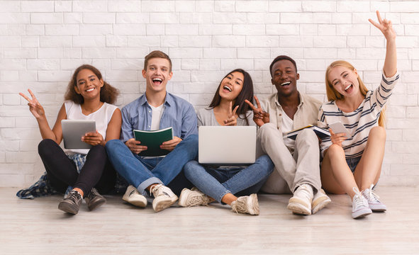 Group of happy students studying for university exams