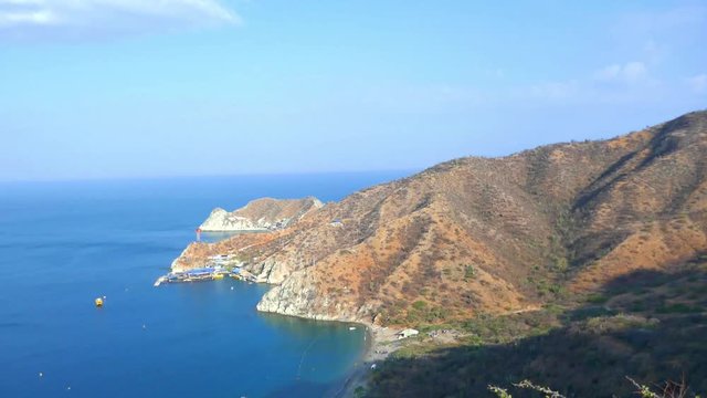 Upper view of paradisiacal beach. Sunny beach with mountains and turquoise sea