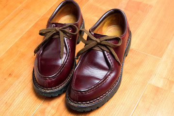 We maintained burgundy leather boots.