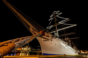 BERGEN, NORWAY - 2015  DECEMBER 23. Norwegian sailing ship Statsraad Lehmkuhl in bow with mooring...