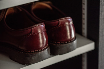 We maintained burgundy leather boots.