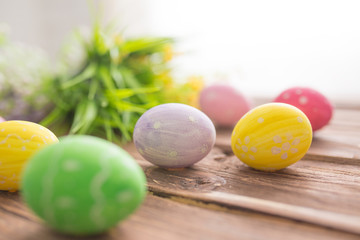 Easter eggs on a old wooden surface