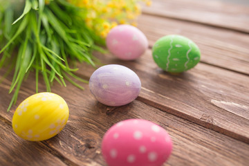 Easter eggs on a old wooden surface