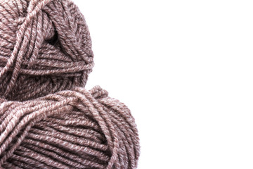 woolen threads on white  background. natural wool knitting background