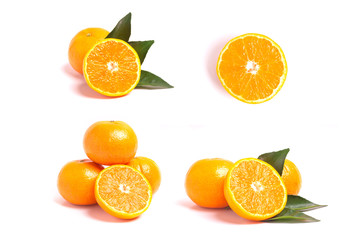 Fresh orange and leaves isolated on white background.