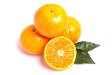 Fresh orange and leaves isolated on white background.