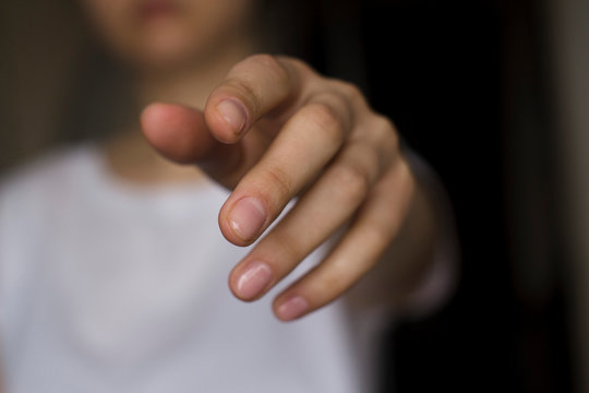 Young Woman's Hand Reaching Out