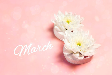 International Women's Day background with chrysanthemum flowers  in the form of eight.