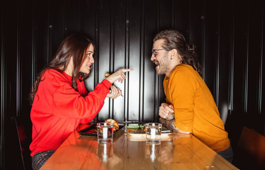 Young Friends Having at Fast Food Restaurant	
