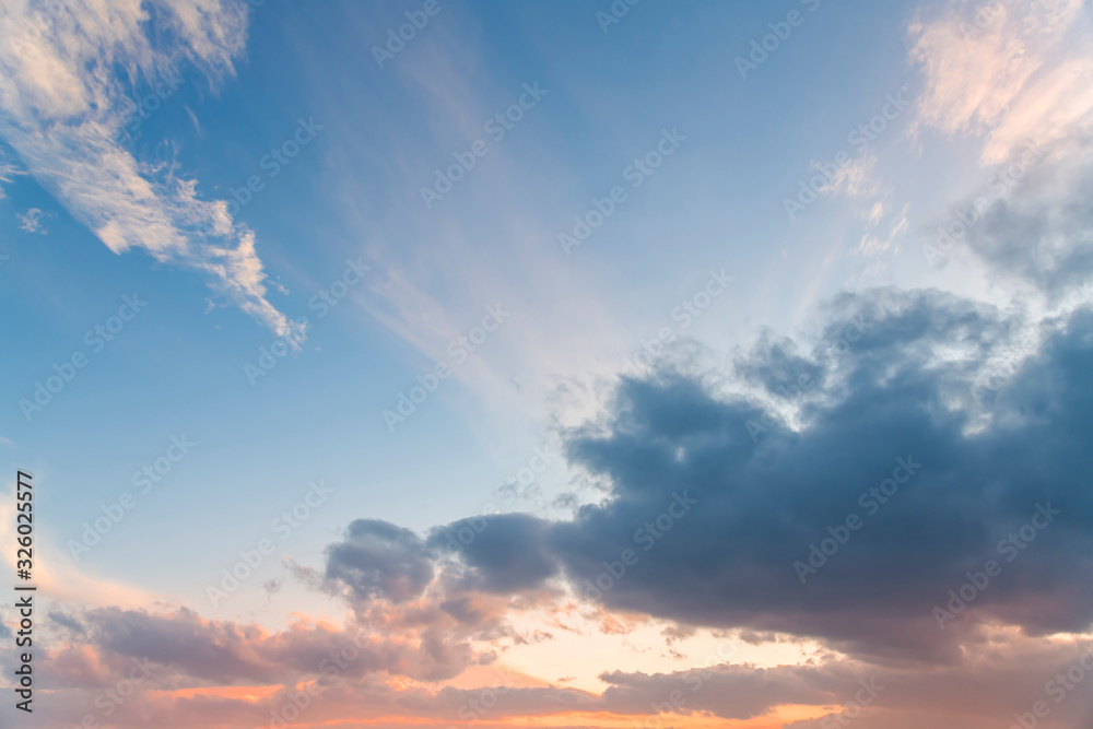 Wall mural beautiful bright sunset sky with clouds. nature sky background.