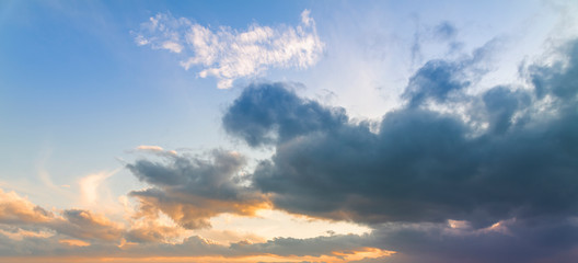 Naklejka na ściany i meble Beautiful bright sunset sky with clouds. Nature sky background. 