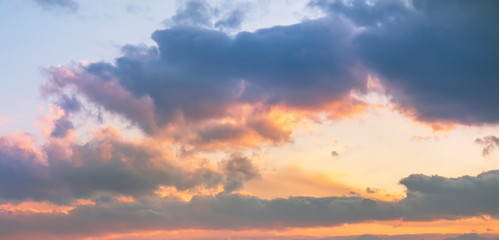 Beautiful bright sunset sky with clouds. Nature sky background. 