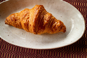 Delicious croissant on a white plate 6 白い皿に乗った美味しそうなのクロワッサン 6