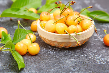 Fresh yellow cherries on the table