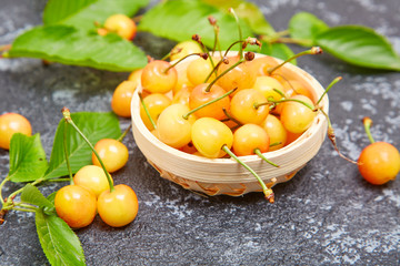 Fresh yellow cherries on the table