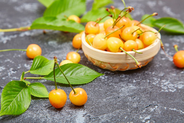 Fresh yellow cherries on the table