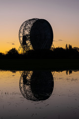 Sunrise at the Lovell Telescope at Jodrell Bank in the Cheshire landscape - a UNESCO World Heritage Site. Radio Telescope Centre for Astrophysics at the University of Manchester
