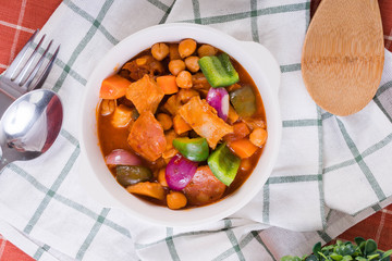 Callos is a stew common across Spain and other colonial influenced country like Philippines. It contains ox tripe, bell pepper, chick peas and onion boiled in tomato sauce