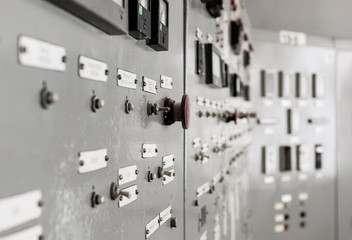 Industry. Regulation and control elements on the control cabinet. Close-up.