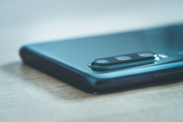 Mobile phone with triple lens. Camera innovation.