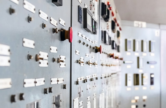Industry. Regulation and control elements on the control cabinet. Close-up.