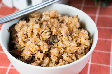 a sticky rice mixed with pork soy sauce and shiitake mushroom also known as kiam pong
