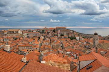 Fototapeta na wymiar View of Dubrovnik old town buildings and red roofs from the city wall