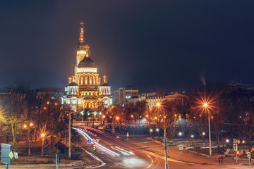 Fototapeta na wymiar Holy Annunciation Cathedral in the evening illuminated by lights, Kharkiv Ukraine
